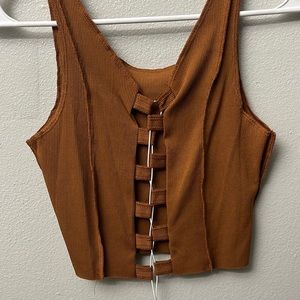 Brown and black going out top
